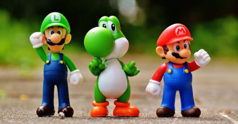Figures - Focus Photo of Super Mario, Luigi, and Yoshi Figurines