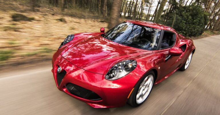 Car - Red Alfa Romeo C4 on Road Near Trees