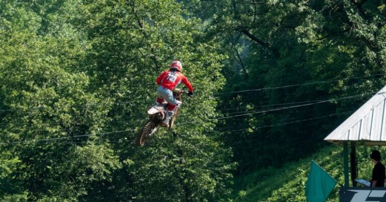 Competitions - Competitor on Motorbike Performing Jump
